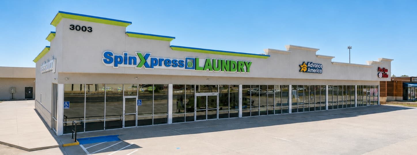 SpinXpress laundry commercial storefront buildout at Elgin Plaza on 50th Street in Lubbock